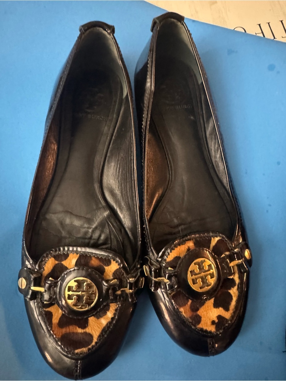 Tory Burch Black Leather Ballet Flats with Leopard Trim and Gold Logo